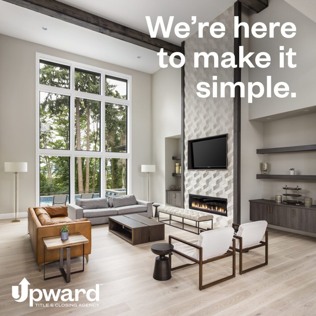 Photo of a family room with windows and television and furniture
